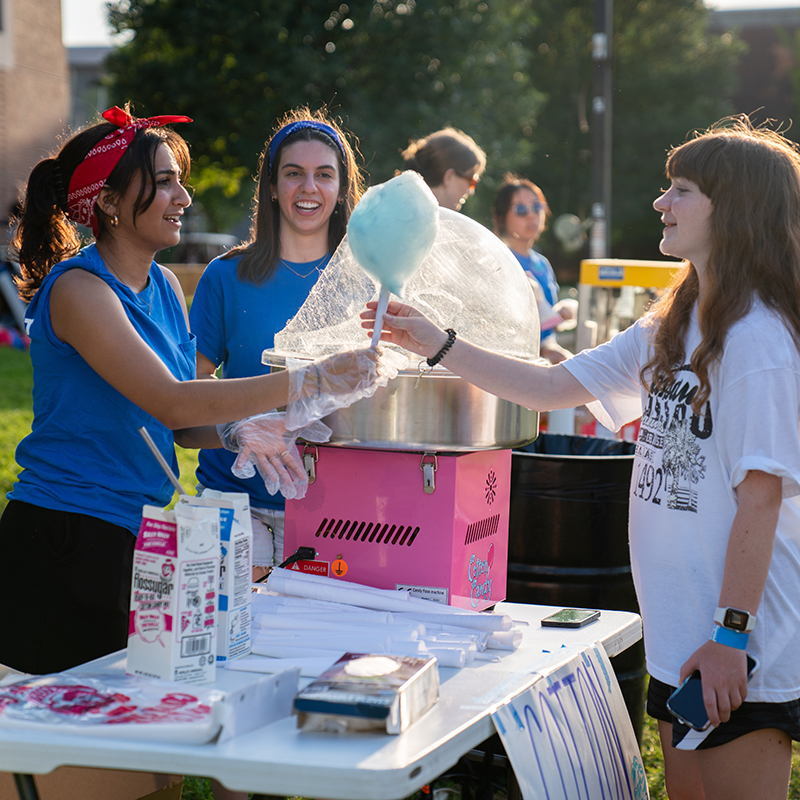 PSUB handing out cotton candy at a Purdue WOW event.